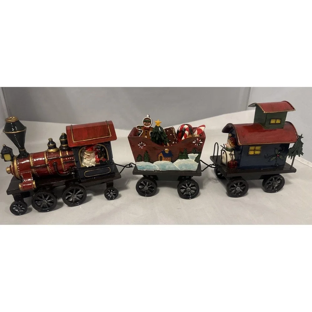 Sterling 3 Piece Resin  Santa,‎ Snowman and Tree Christmas Train Set.